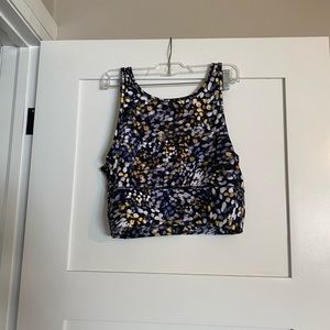 Power pivot tank top